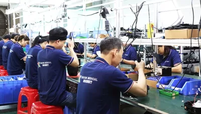 Lini Produksi Sepatu Kompresi